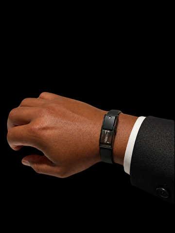 Fragrance Plug fragrance bracelet in black worn on the wrist